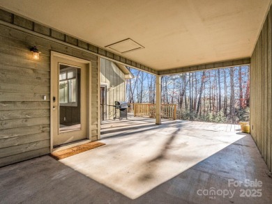 Modern farmhouse meets contemporary chic in this beautiful on Rumbling Bald Resort on Lake Lure in North Carolina - for sale on GolfHomes.com, golf home, golf lot