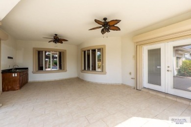 This beautiful 4-bedroom, 3.5-bath home with a finished 3-car on South Padre Island Golf Club in Texas - for sale on GolfHomes.com, golf home, golf lot