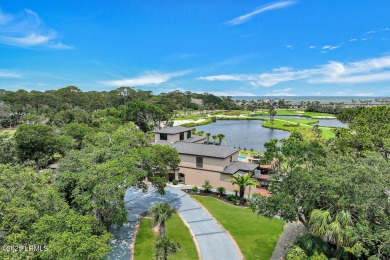 Discover the pinnacle of Lowcountry living at 618 Dolphin Annex on Ocean Point Golf Links in South Carolina - for sale on GolfHomes.com, golf home, golf lot