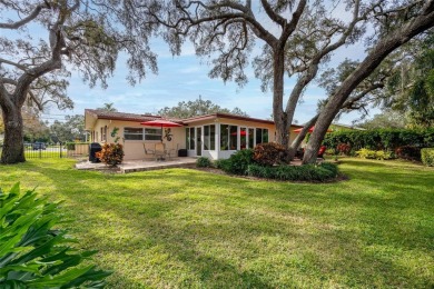 Presenting A Polished Retreat in Fairway Estates! 
A welcoming on The Dunedin Country Club in Florida - for sale on GolfHomes.com, golf home, golf lot