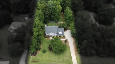 WELCOME HOME TO LAKE DOW NORTH! Located in the prestigious and on Canongate At Georgia National Golf Club in Georgia - for sale on GolfHomes.com, golf home, golf lot