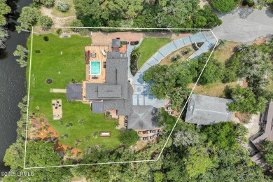 Discover the pinnacle of Lowcountry living at 618 Dolphin Annex on Ocean Point Golf Links in South Carolina - for sale on GolfHomes.com, golf home, golf lot
