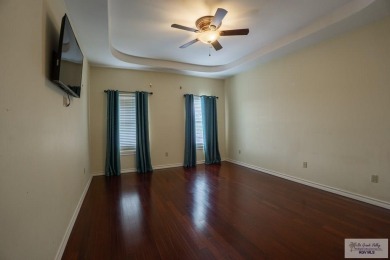 This beautiful 4-bedroom, 3.5-bath home with a finished 3-car on South Padre Island Golf Club in Texas - for sale on GolfHomes.com, golf home, golf lot