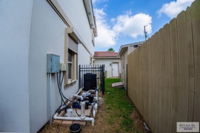 This beautiful 4-bedroom, 3.5-bath home with a finished 3-car on South Padre Island Golf Club in Texas - for sale on GolfHomes.com, golf home, golf lot