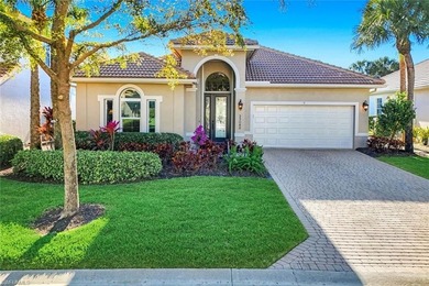 This impeccably maintained residence is nestled within Laurel on Shadow Wood Country Club in Florida - for sale on GolfHomes.com, golf home, golf lot