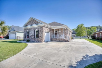 Don't miss this beautiful three bedroom 2.5 bath home in the on Cypress Bay Golf Club in South Carolina - for sale on GolfHomes.com, golf home, golf lot