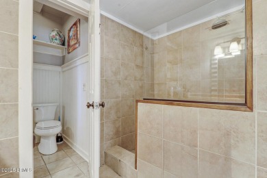 Discover the pinnacle of Lowcountry living at 618 Dolphin Annex on Ocean Point Golf Links in South Carolina - for sale on GolfHomes.com, golf home, golf lot