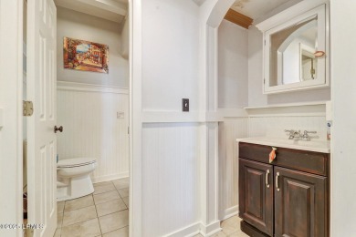 Discover the pinnacle of Lowcountry living at 618 Dolphin Annex on Ocean Point Golf Links in South Carolina - for sale on GolfHomes.com, golf home, golf lot