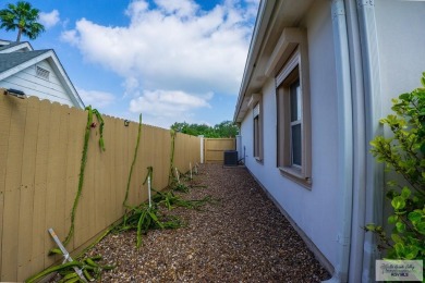 This beautiful 4-bedroom, 3.5-bath home with a finished 3-car on South Padre Island Golf Club in Texas - for sale on GolfHomes.com, golf home, golf lot