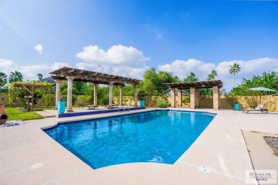 This beautiful 4-bedroom, 3.5-bath home with a finished 3-car on South Padre Island Golf Club in Texas - for sale on GolfHomes.com, golf home, golf lot