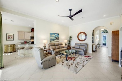 This impeccably maintained residence is nestled within Laurel on Shadow Wood Country Club in Florida - for sale on GolfHomes.com, golf home, golf lot