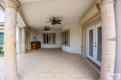 This beautiful 4-bedroom, 3.5-bath home with a finished 3-car on South Padre Island Golf Club in Texas - for sale on GolfHomes.com, golf home, golf lot