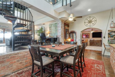 Discover the pinnacle of Lowcountry living at 618 Dolphin Annex on Ocean Point Golf Links in South Carolina - for sale on GolfHomes.com, golf home, golf lot