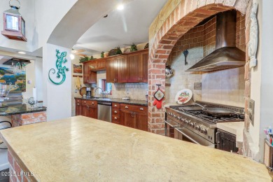 Discover the pinnacle of Lowcountry living at 618 Dolphin Annex on Ocean Point Golf Links in South Carolina - for sale on GolfHomes.com, golf home, golf lot
