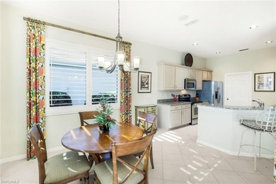 This impeccably maintained residence is nestled within Laurel on Shadow Wood Country Club in Florida - for sale on GolfHomes.com, golf home, golf lot