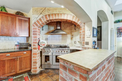 Discover the pinnacle of Lowcountry living at 618 Dolphin Annex on Ocean Point Golf Links in South Carolina - for sale on GolfHomes.com, golf home, golf lot