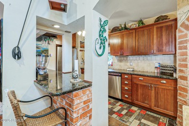 Discover the pinnacle of Lowcountry living at 618 Dolphin Annex on Ocean Point Golf Links in South Carolina - for sale on GolfHomes.com, golf home, golf lot