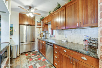 Discover the pinnacle of Lowcountry living at 618 Dolphin Annex on Ocean Point Golf Links in South Carolina - for sale on GolfHomes.com, golf home, golf lot