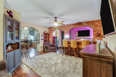 Discover the pinnacle of Lowcountry living at 618 Dolphin Annex on Ocean Point Golf Links in South Carolina - for sale on GolfHomes.com, golf home, golf lot