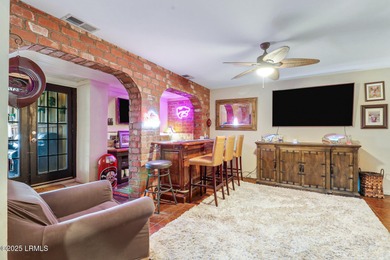 Discover the pinnacle of Lowcountry living at 618 Dolphin Annex on Ocean Point Golf Links in South Carolina - for sale on GolfHomes.com, golf home, golf lot