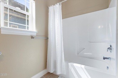 Beautifully maintained single-level home in the desirable Garden on Chinook Winds Golf Resort in Oregon - for sale on GolfHomes.com, golf home, golf lot