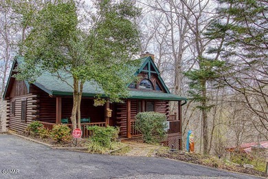 Stunning ''Lakota Wolf'' Cabin Retreat in Sevierville, TN - on Sevierville Golf Club in Tennessee - for sale on GolfHomes.com, golf home, golf lot