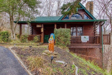 Stunning ''Lakota Wolf'' Cabin Retreat in Sevierville, TN - on Sevierville Golf Club in Tennessee - for sale on GolfHomes.com, golf home, golf lot