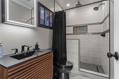 Discover a rare opportunity to own a beautifully updated home in on The Golf Club of Georgia in Georgia - for sale on GolfHomes.com, golf home, golf lot