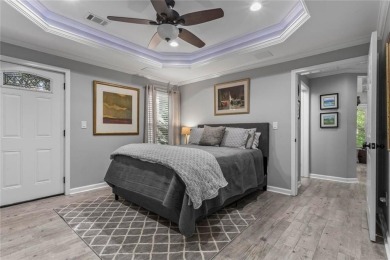 Discover a rare opportunity to own a beautifully updated home in on The Golf Club of Georgia in Georgia - for sale on GolfHomes.com, golf home, golf lot