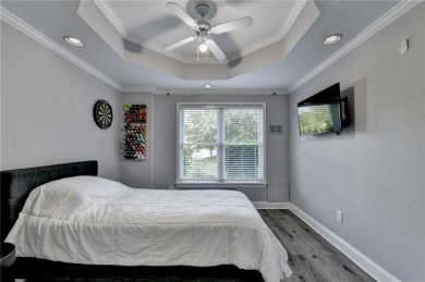 Poised on a 1/3-acre corner lot on a quiet cul-de-sac, this on Hamilton Mill Golf Club in Georgia - for sale on GolfHomes.com, golf home, golf lot