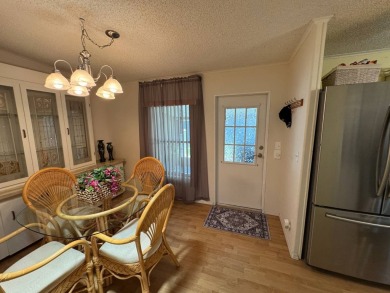 MOTIVATED SELLER! Don't miss this spacious, beautiful home in on Lake Henry Golf Club in Florida - for sale on GolfHomes.com, golf home, golf lot