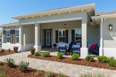 Gorgeous ALMOST NEW 2024 home in Candler Hills in On Top of the on On Top of the World Golf Course in Florida - for sale on GolfHomes.com, golf home, golf lot