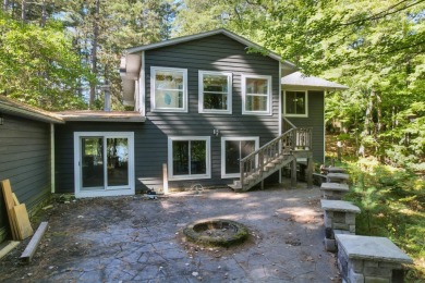 Welcome to a unique opportunity to transform this spacious home on Eagle River Golf Course in Wisconsin - for sale on GolfHomes.com, golf home, golf lot