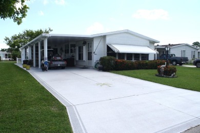 LAND OWNED -  Spacious & Open Floor Plan, this 2/2 has large on Savanna Golf Club in Florida - for sale on GolfHomes.com, golf home, golf lot