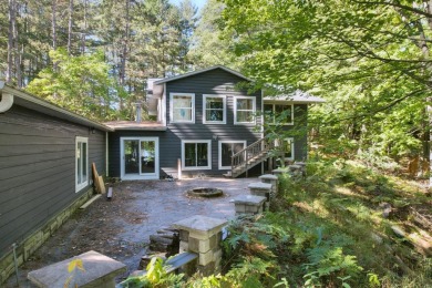 Welcome to a unique opportunity to transform this spacious home on Eagle River Golf Course in Wisconsin - for sale on GolfHomes.com, golf home, golf lot