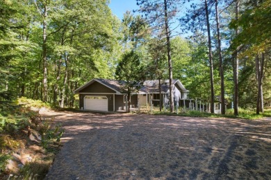 Welcome to a unique opportunity to transform this spacious home on Eagle River Golf Course in Wisconsin - for sale on GolfHomes.com, golf home, golf lot