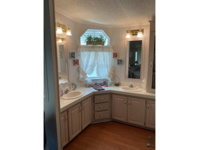 TIRED OF SNOW,ICE AND COLD, TRADE THAT IN FOR SUN,WARM AND WHITE on Pine Lakes Country Club in Florida - for sale on GolfHomes.com, golf home, golf lot