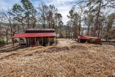 Nestled in the heart of the scenic Pineywoods, this charming on Pine Dunes Golf Course in Texas - for sale on GolfHomes.com, golf home, golf lot