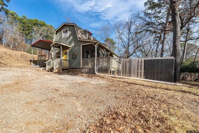 Nestled in the heart of the scenic Pineywoods, this charming on Pine Dunes Golf Course in Texas - for sale on GolfHomes.com, golf home, golf lot