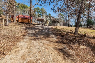 Nestled in the heart of the scenic Pineywoods, this charming on Pine Dunes Golf Course in Texas - for sale on GolfHomes.com, golf home, golf lot