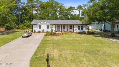 Completely Remodeled Coastal Gem in the Heart of Southport Step on The Lakes Country Club in North Carolina - for sale on GolfHomes.com, golf home, golf lot