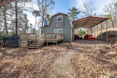 Nestled in the heart of the scenic Pineywoods, this charming on Pine Dunes Golf Course in Texas - for sale on GolfHomes.com, golf home, golf lot