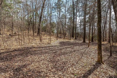 Nestled in the heart of the scenic Pineywoods, this charming on Pine Dunes Golf Course in Texas - for sale on GolfHomes.com, golf home, golf lot