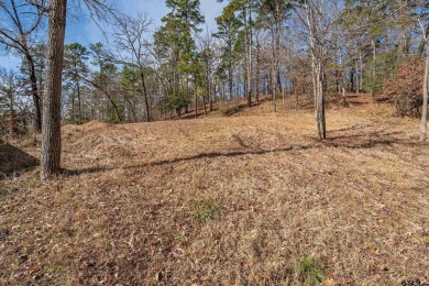 Nestled in the heart of the scenic Pineywoods, this charming on Pine Dunes Golf Course in Texas - for sale on GolfHomes.com, golf home, golf lot