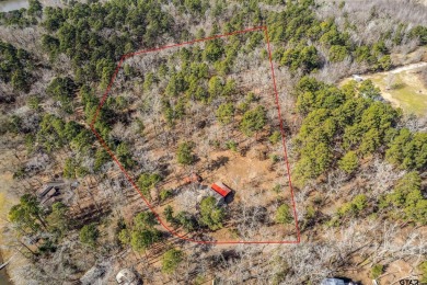 Nestled in the heart of the scenic Pineywoods, this charming on Pine Dunes Golf Course in Texas - for sale on GolfHomes.com, golf home, golf lot