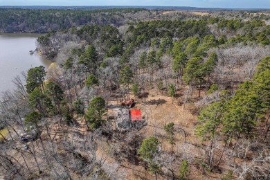 Nestled in the heart of the scenic Pineywoods, this charming on Pine Dunes Golf Course in Texas - for sale on GolfHomes.com, golf home, golf lot