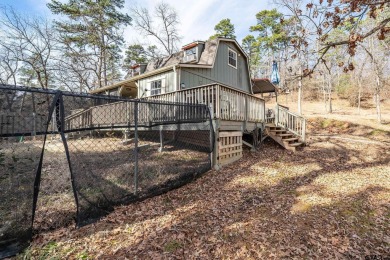 Nestled in the heart of the scenic Pineywoods, this charming on Pine Dunes Golf Course in Texas - for sale on GolfHomes.com, golf home, golf lot