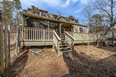 Nestled in the heart of the scenic Pineywoods, this charming on Pine Dunes Golf Course in Texas - for sale on GolfHomes.com, golf home, golf lot