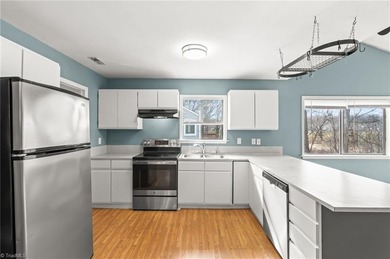 Enjoy easy living in this charming 2-bedroom, 2-bath townhome on Heather Hills Golf Course in North Carolina - for sale on GolfHomes.com, golf home, golf lot