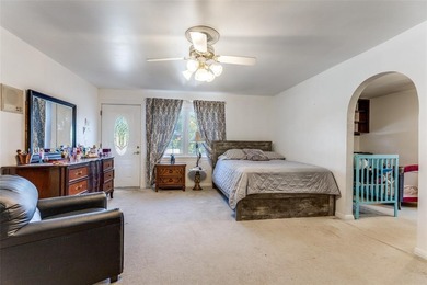 Private lakefront Spanish-style stucco home on the golf course on Diamond Oaks Golf and Country Club in Texas - for sale on GolfHomes.com, golf home, golf lot